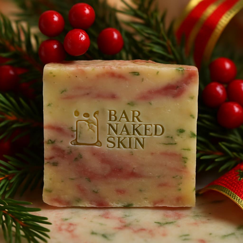 A close-up shot of the 'BAR NAKED SKIN' showcasing its detailed greenery, berries, and festive ribbons against a blurred background of holiday decor, emphasizing its vibrant colors and texture.